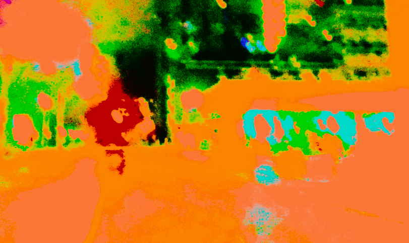 Industrial Orange -- a Chemical Spill, a visual poem by Robert Frede Kenter (2023). Garish orange, greens, yellows, dark red like a chemical spill, or a view of a targeted landscape from the air.