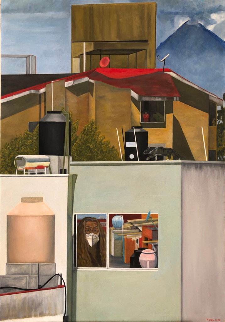 A large vertical painting. Near the bottom, the artist is in a window at home wearing a covid-mask, her work-studio in the right pane. above are other adobe homes, geometrical almost otherworldly patterned, with rooftop and a volcano in the right upper painting, grey-blue.