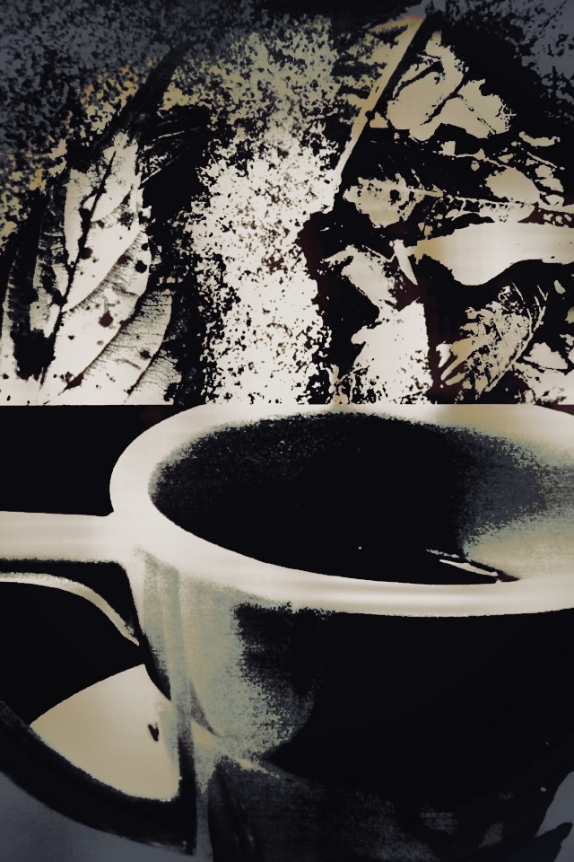 Monochromatic high contrast grainy image with hints of green and yellow tones, of coffee cup in foreground with autumn leaves mulch decay an Image by Hiromi Suzuki