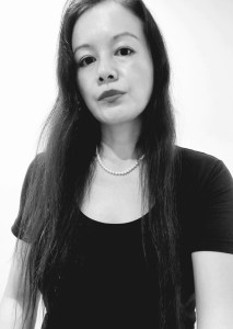 Title: "Sobriety" a photo image by Vikki C.  (c) 2025.  an image of a wild-grass covered in white fluffy seeds with other grasses and trees in the background