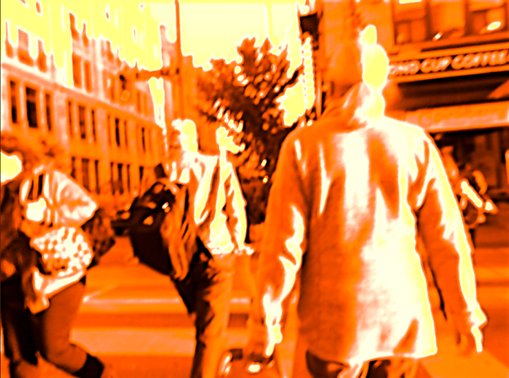 Orange-yellow dream image of a runner weaving through pedestrians  at a major downtown urban intersection.   "Motion of Flight" (c) 2025 Robert Frede Kenter.