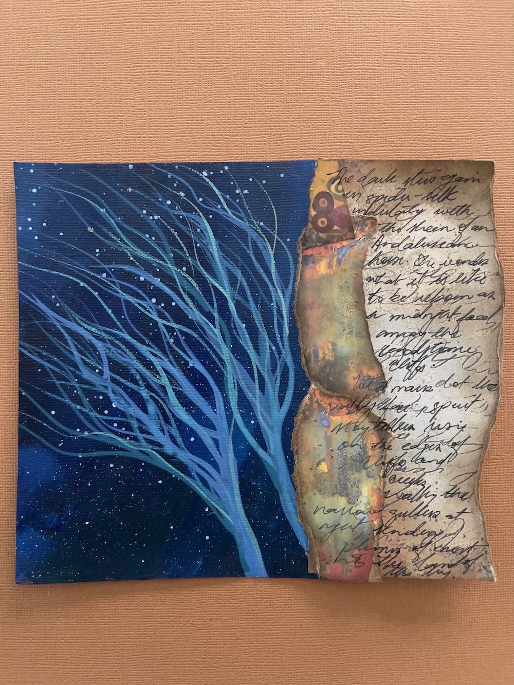 Blue haunted trees against a darker blue background on left side of page, on right the hand written poem-text in a complex folded scroll. Section 8 of 10 art works/hybrids by the artist